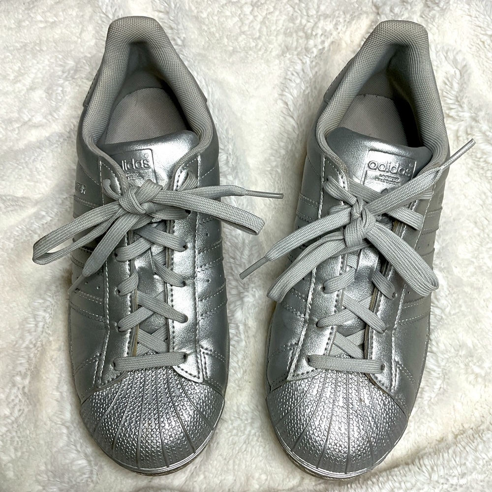 Metallic silver Adidas Superstars